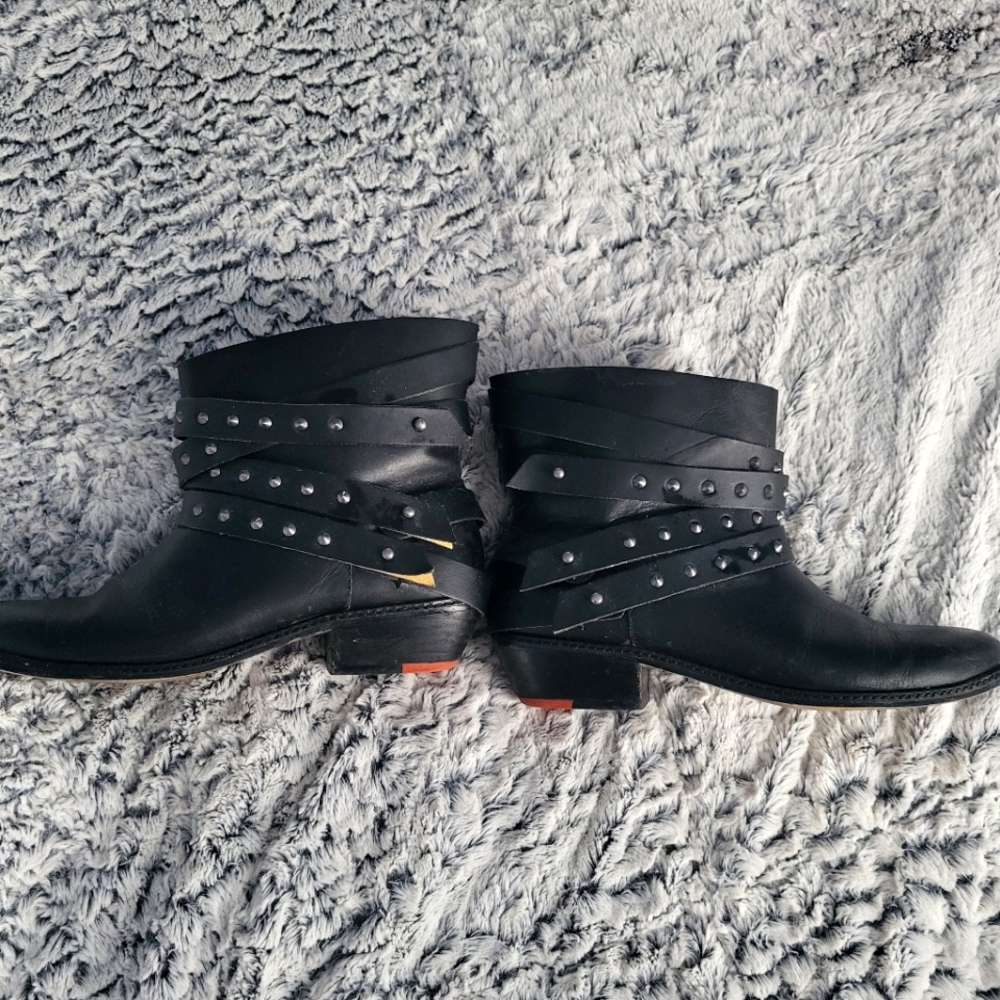 Women's black leather strapped moto studded ankle boots